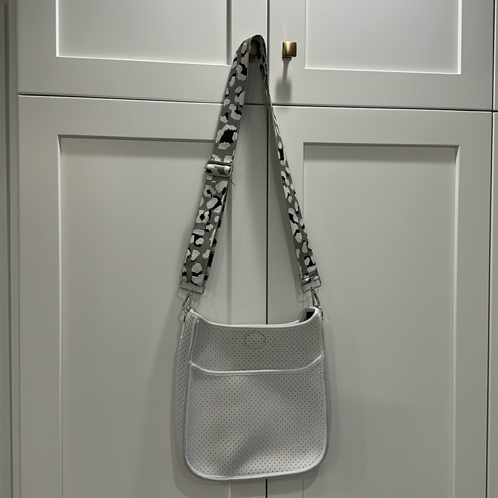 Gently used ah•dorned neoprene bag with new crossbody strap